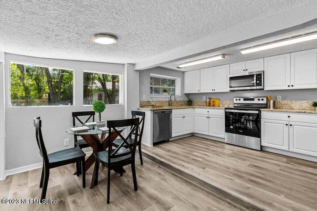 9977 Sibbald Road Jacksonville, FL 32208 - Photo 17 of 25 kitchen eating space