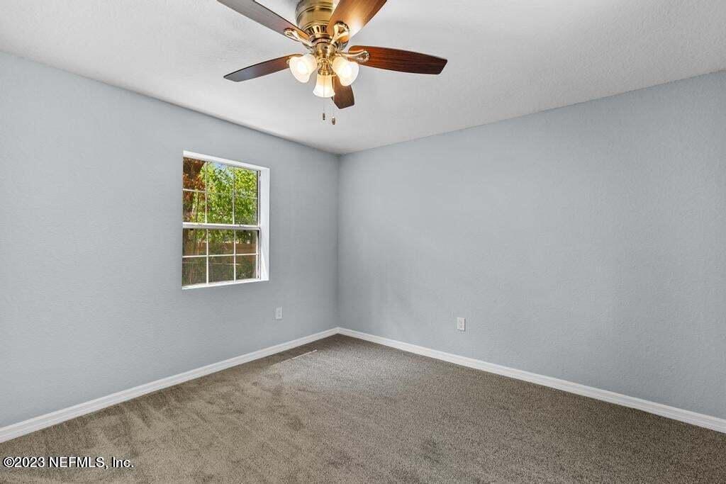 9977 Sibbald Road Jacksonville, FL 32208 - Photo 5 of 25 20230413133418492111000000-o
