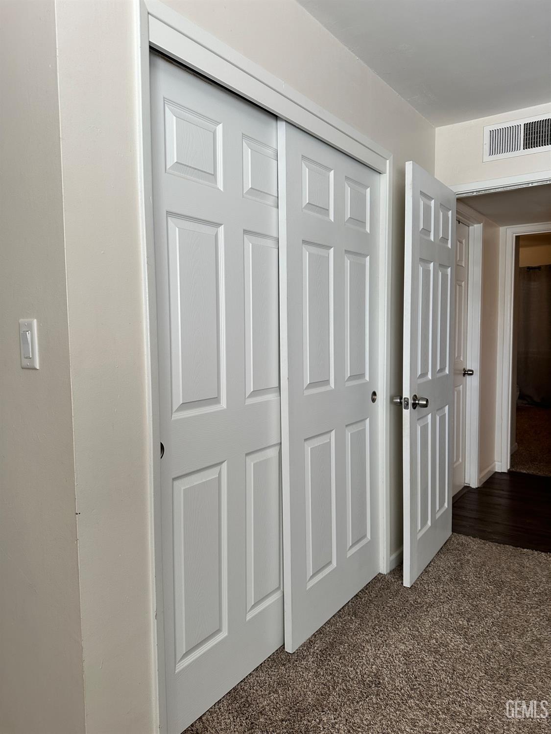 Undisclosed Address Bakersfield, CA 93312 - Photo 21 of 51 a view of a livingroom with wooden floor and a bathroom