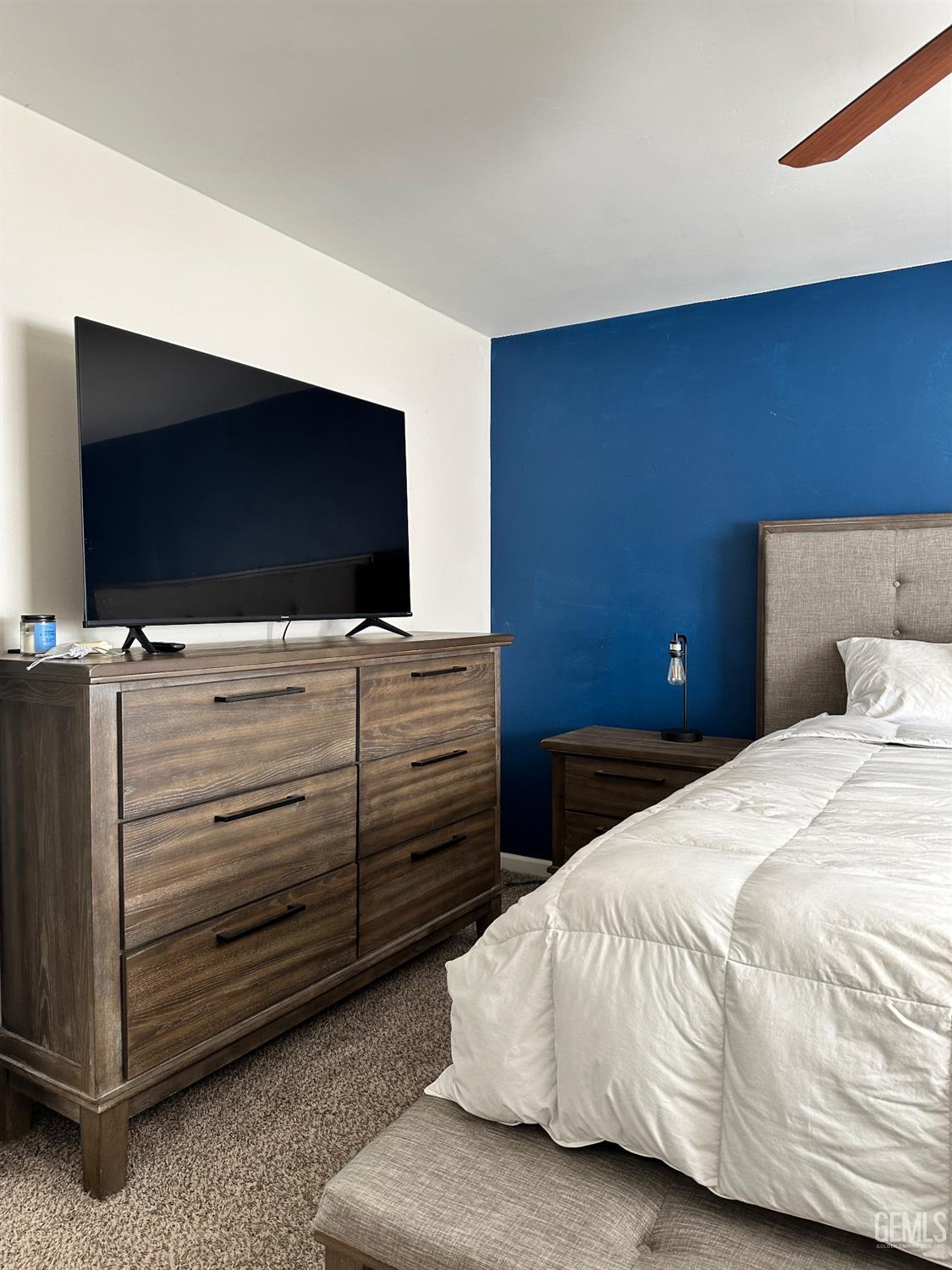 Undisclosed Address Bakersfield, CA 93312 - Photo 26 of 51 a bedroom with a bed and flat screen tv