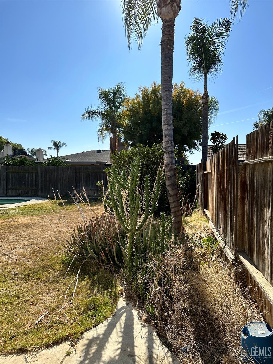 Undisclosed Address Bakersfield, CA 93312 - Photo 41 of 51 a view of a backyard of the house