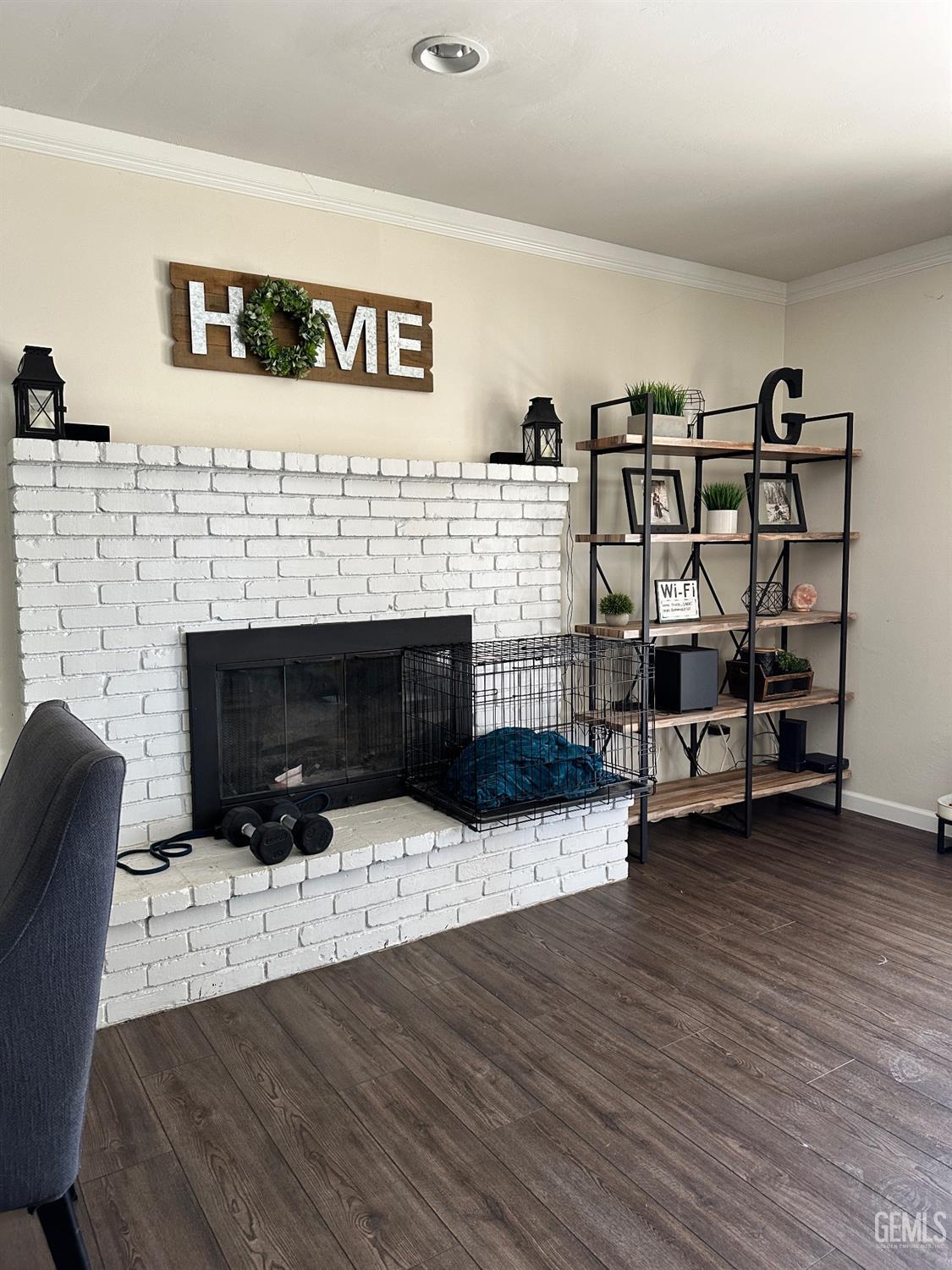 Undisclosed Address Bakersfield, CA 93312 - Photo 48 of 51 a living room with furniture and a fireplace