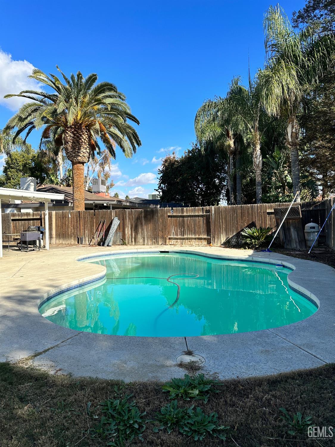 Undisclosed Address Bakersfield, CA 93312 - Photo 50 of 51 a view of a backyard with swimming pool