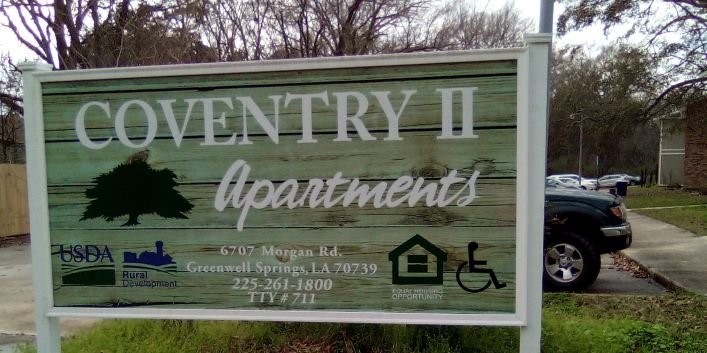 6707 Morgan Road, Unit 32 Greenwell Springs, LA 70739 - Photo 4 of 7 front view of a house with a yard