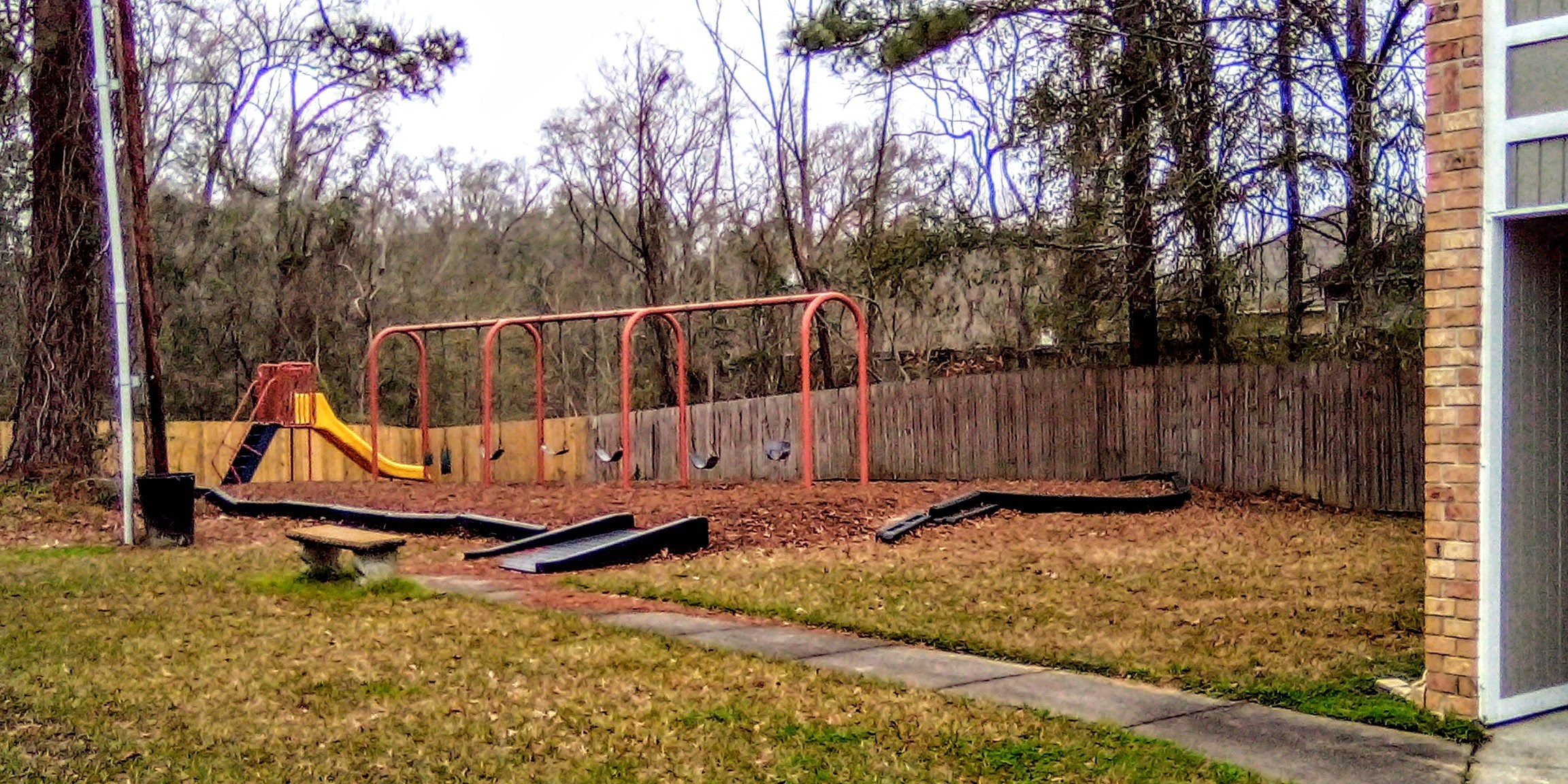 6707 Morgan Road, Unit 32 Greenwell Springs, LA 70739 - Photo 5 of 7 a small garden covered with tall trees