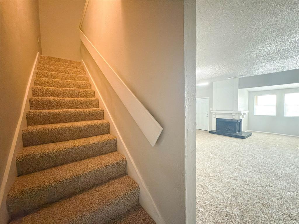 9696 Walnut Street, Unit 2108 Dallas, TX 75243 - Photo 12 of 21 a view of entryway and hall with wooden floor