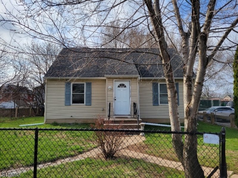a front view of house with yard