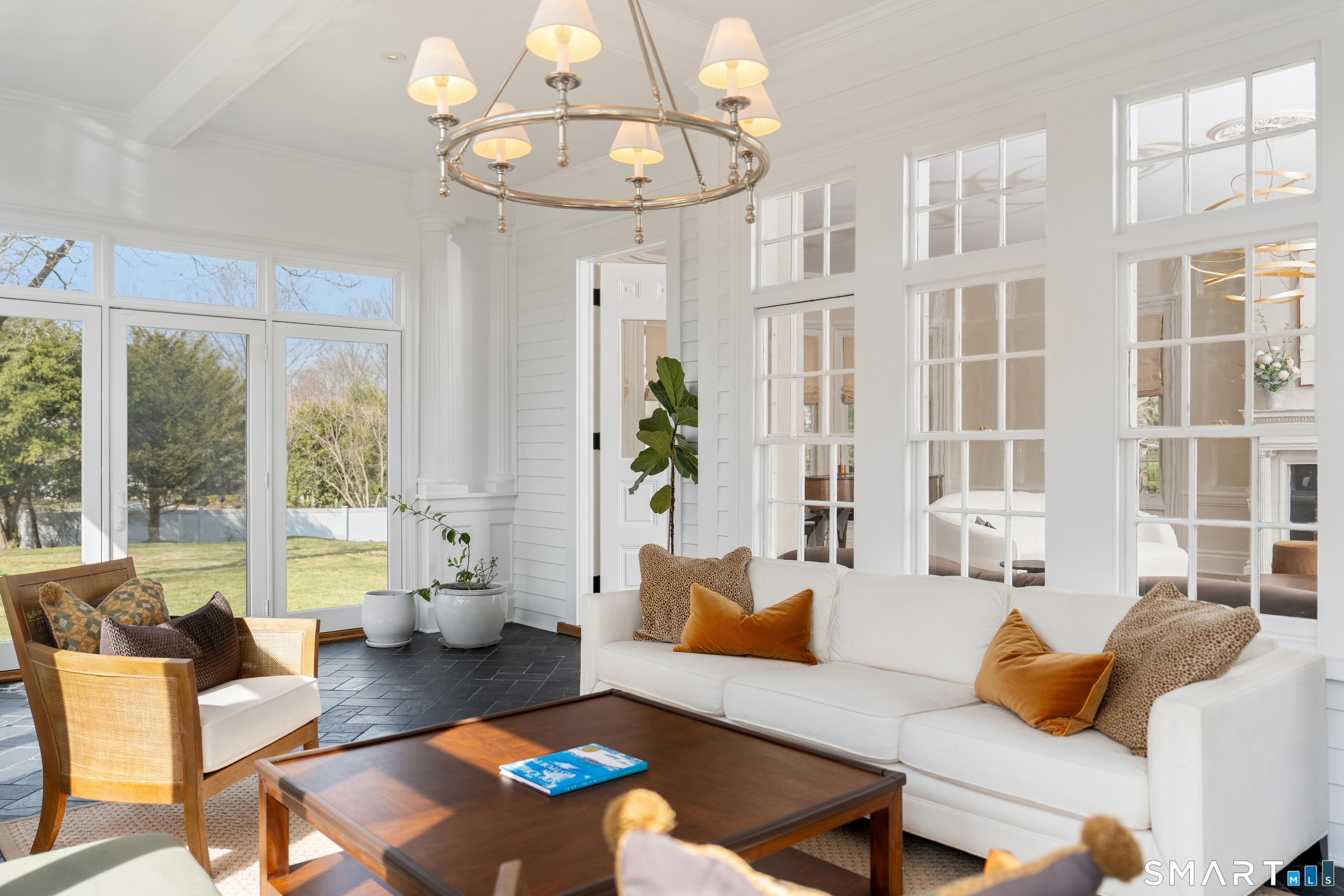 5 Middlesex Road Darien, CT 06820 - Photo 22 of 38 Garden room with heated slate floors opens to the living room