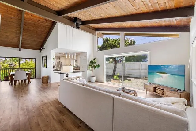 601 Neptune Avenue Encinitas, CA 92024 - Photo 2 of 36 a room with furniture and a large window