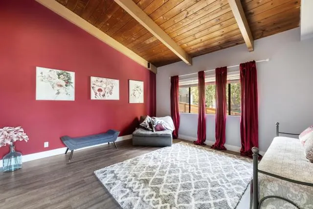 601 Neptune Avenue Encinitas, CA 92024 - Photo 22 of 36 a bedroom with furniture and windows