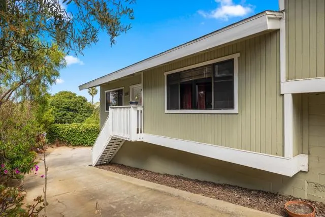 601 Neptune Avenue Encinitas, CA 92024 - Photo 26 of 36 a view of a house with a yard