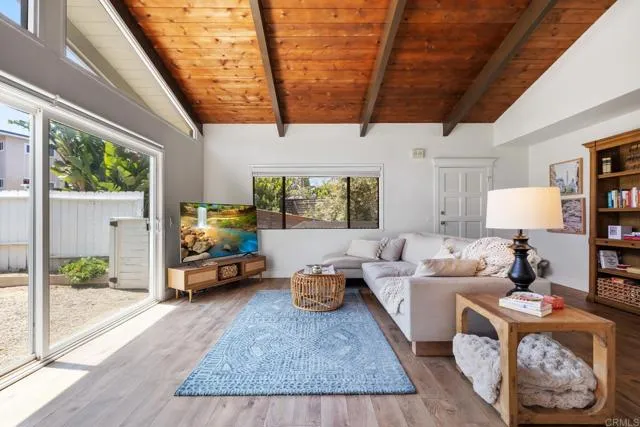 601 Neptune Avenue Encinitas, CA 92024 - Photo 3 of 36 a living room with furniture and a large window