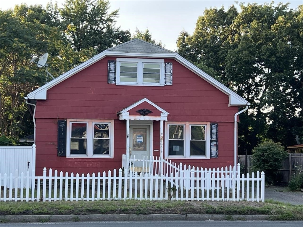 a front view of a house with a porch