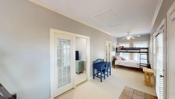 a living room with furniture a dining table and kitchen view