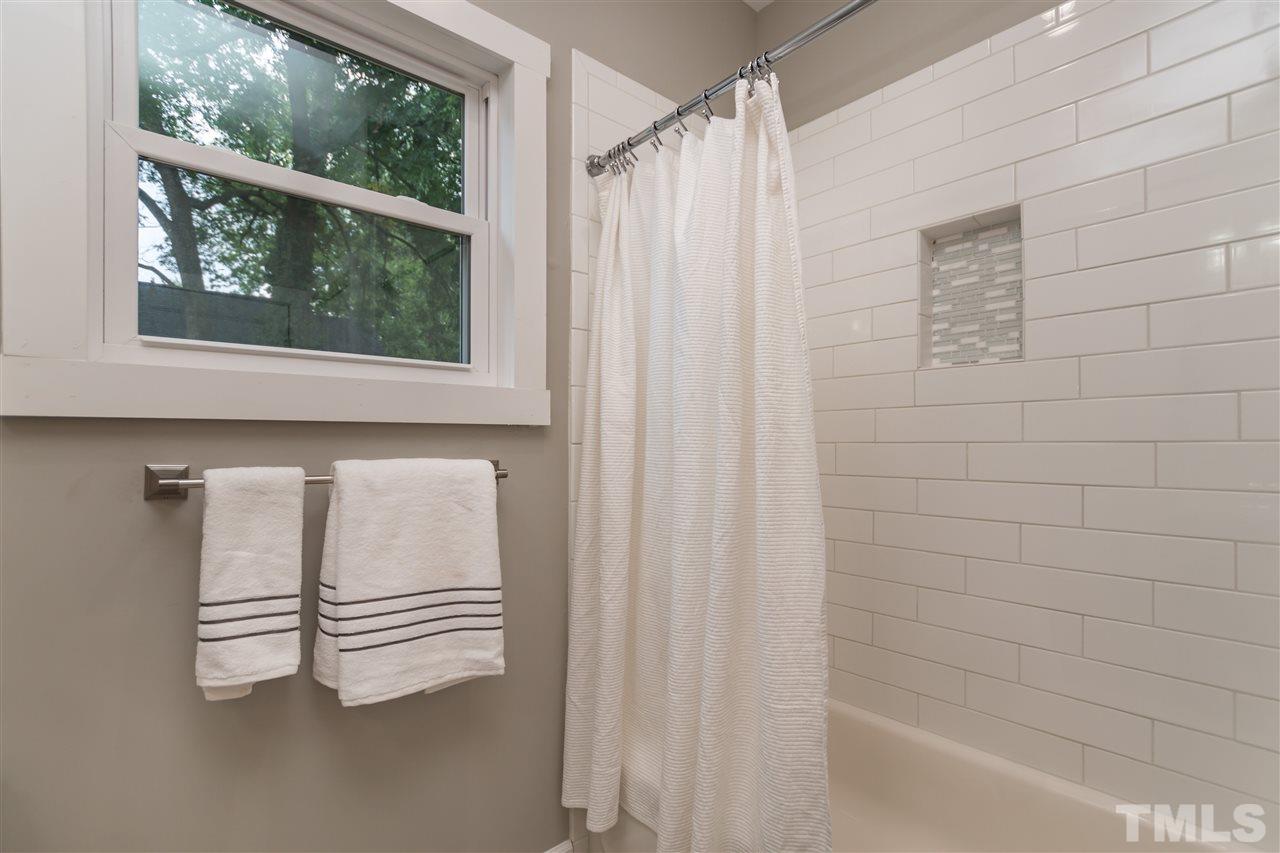 830 East Martin Street Raleigh, NC 27601 - Photo 16 of 24 a bathroom with a shower