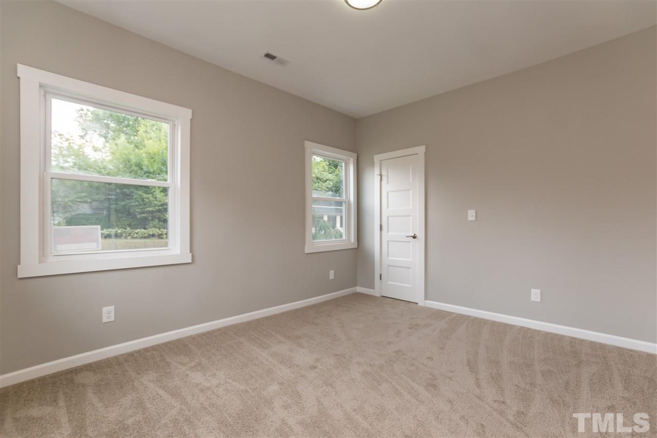 830 East Martin Street Raleigh, NC 27601 - Photo 17 of 24 a view of an empty room with a window