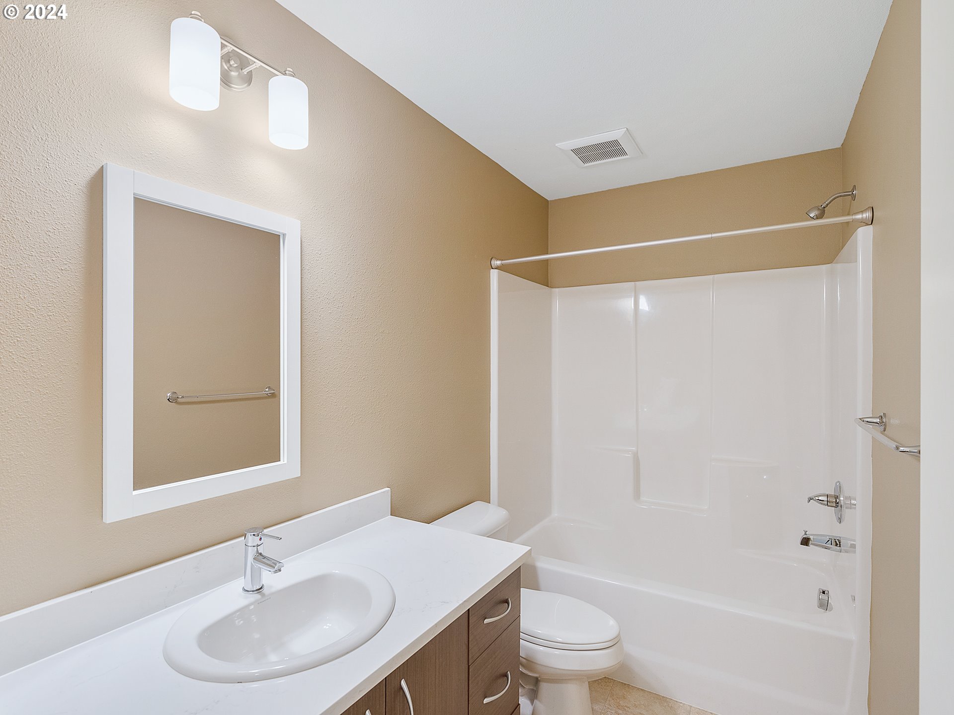 10827 East Burnside Street Portland, OR 97216 - Photo 18 of 28 a bathroom with a sink toilet and shower