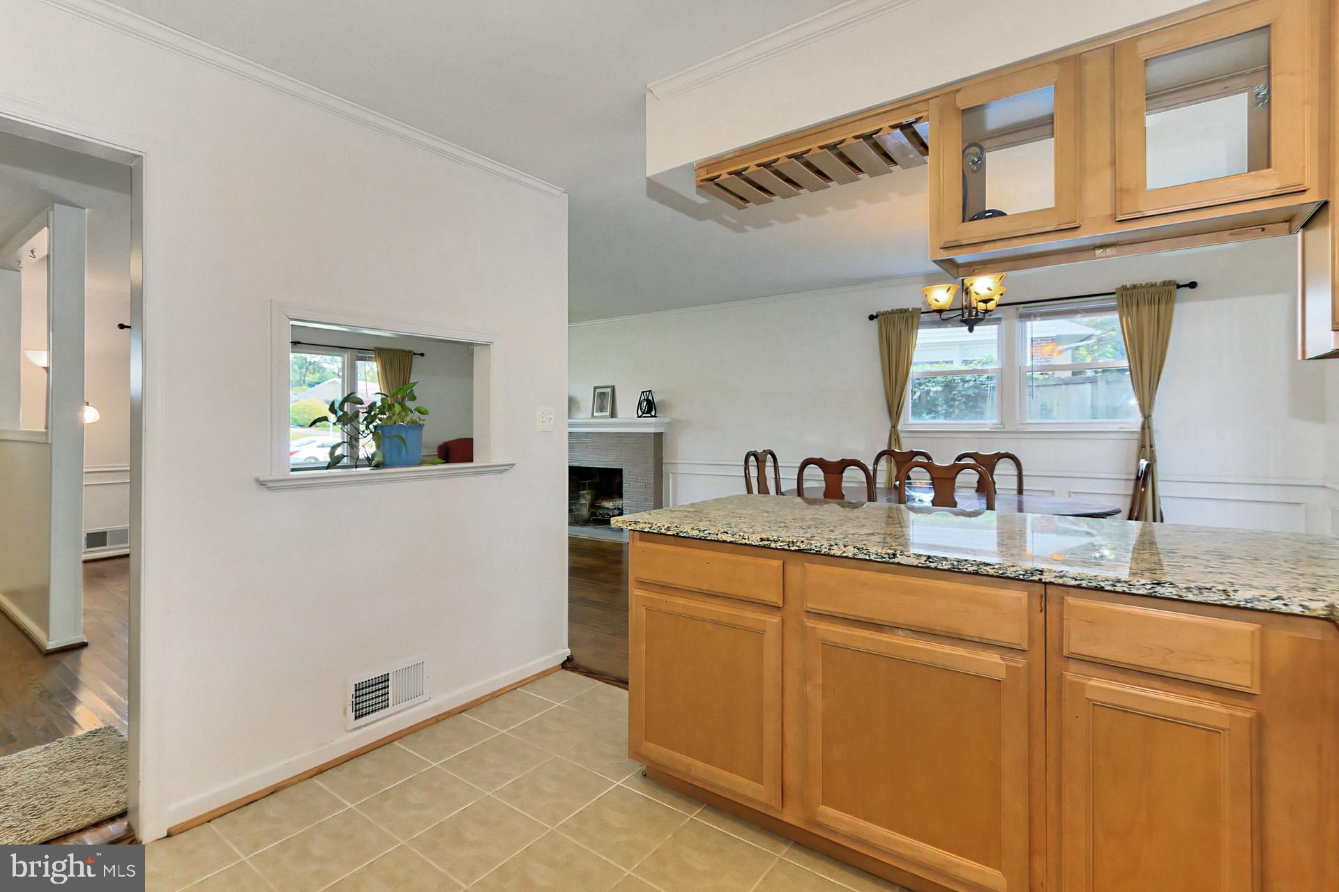8139 Drayton Lane Springfield, VA 22151 - Photo 16 of 44 Kitchen with Passthrough to Living Room