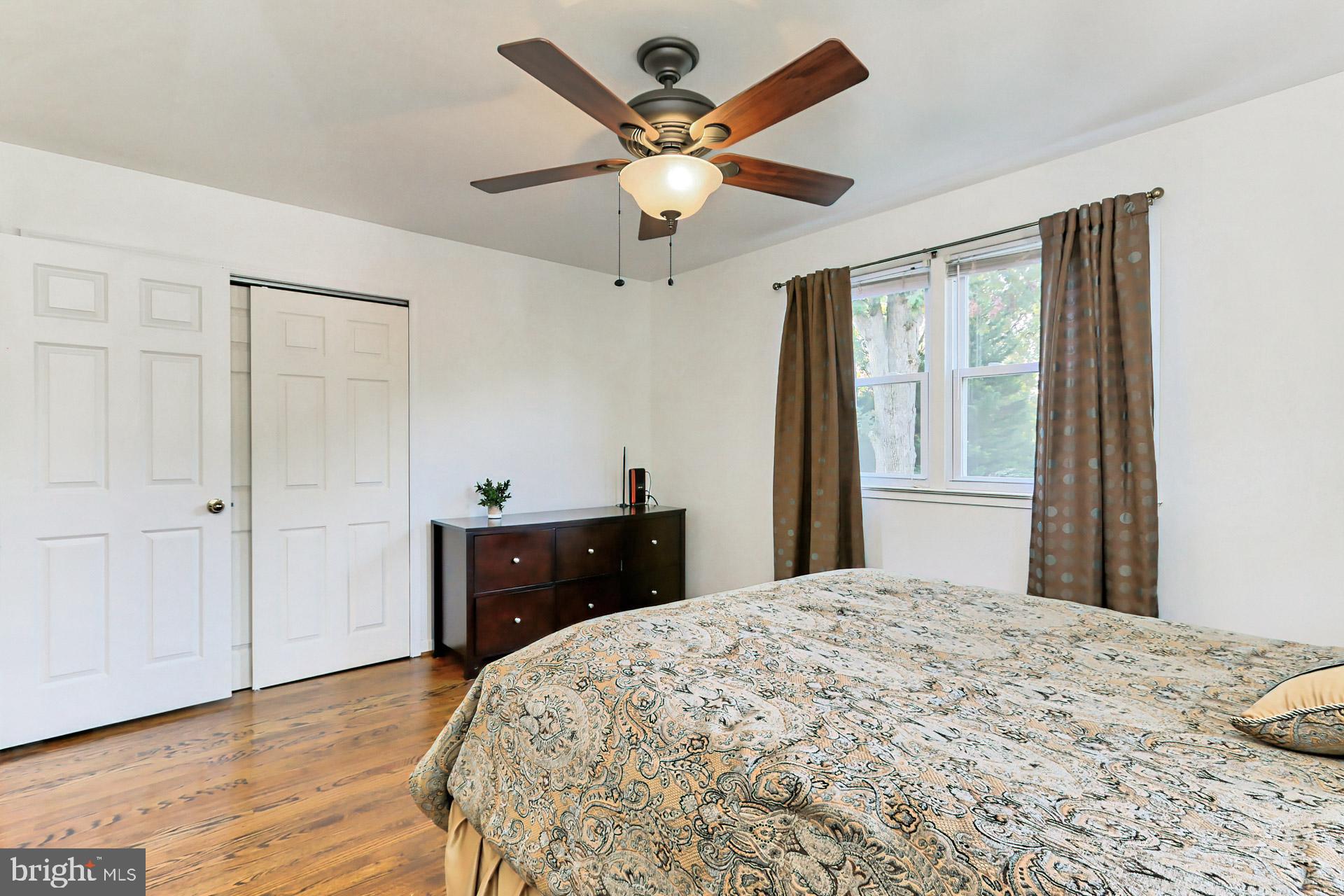 8139 Drayton Lane Springfield, VA 22151 - Photo 20 of 44 Bedroom 1 with Ceiling Fan View of Rear Yard