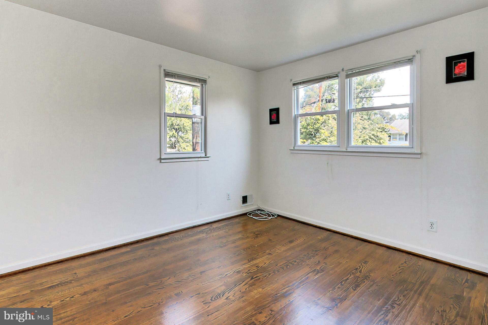 8139 Drayton Lane Springfield, VA 22151 - Photo 21 of 44 Bedroom 2 with Wood Floors