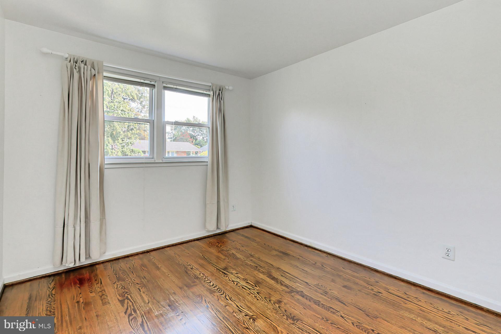 8139 Drayton Lane Springfield, VA 22151 - Photo 22 of 44 Bedroom 3 with Wood Floors