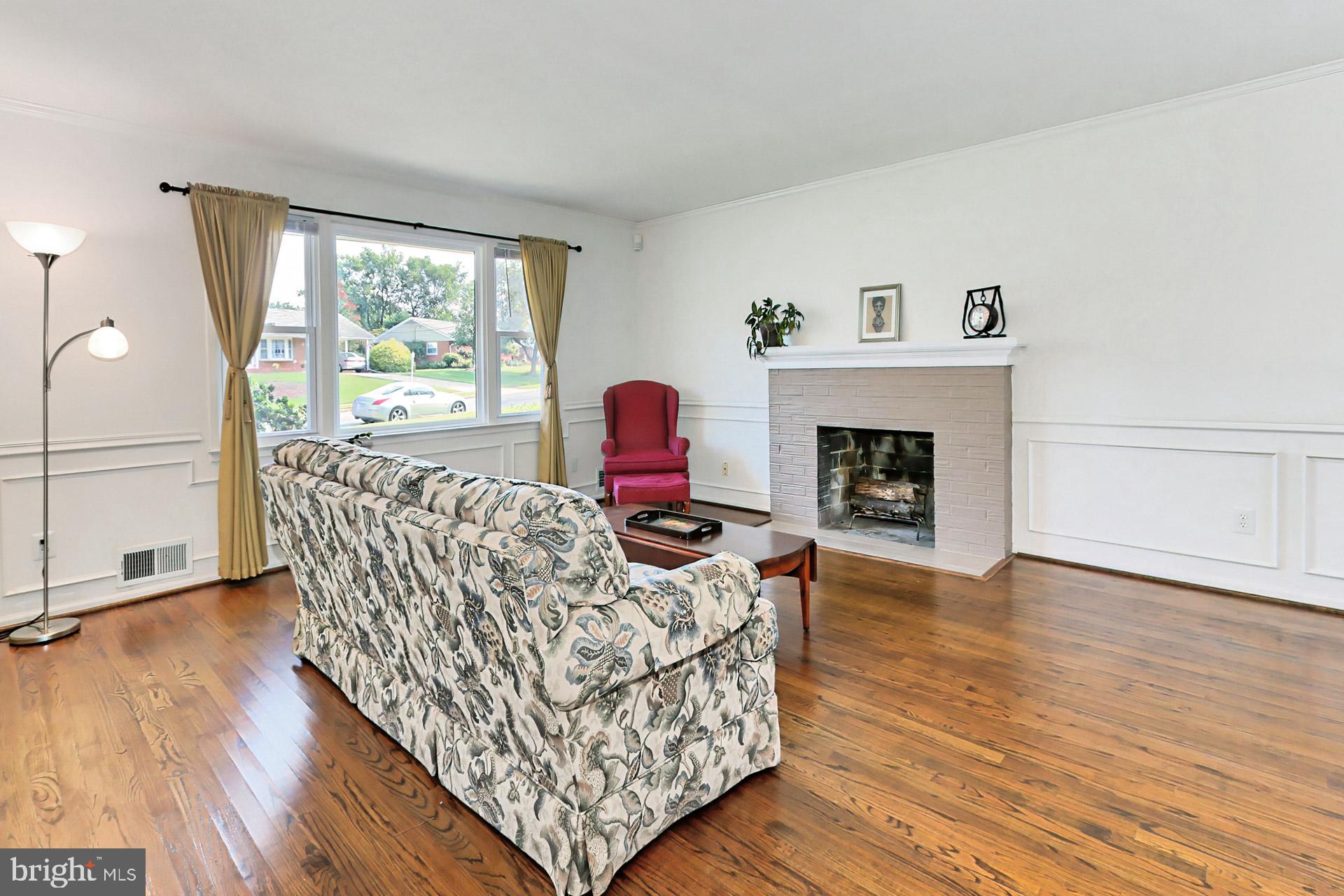 8139 Drayton Lane Springfield, VA 22151 - Photo 5 of 44 Spacious Living Room w/Wood Burning Fireplace