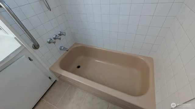 a bathroom with a bathtub