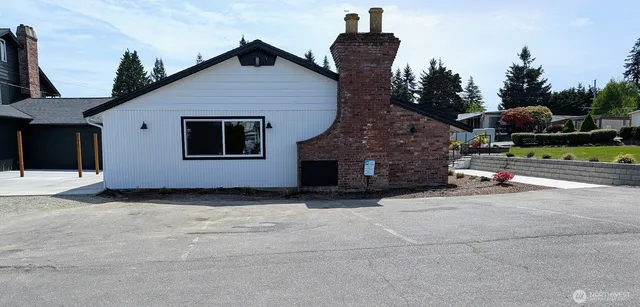 a view of a house with a street