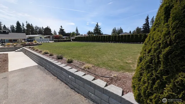 a view of a lake with outdoor space