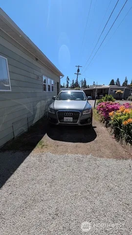 a view of a backyard of the house