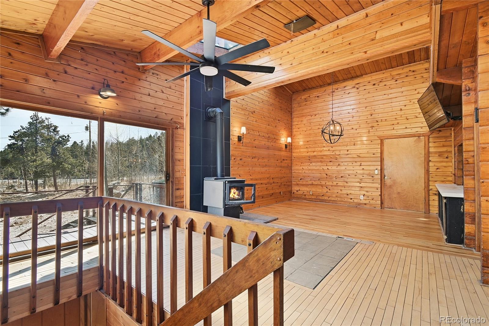 61 Ramona Road Golden, CO 80403 - Photo 11 of 49 a view of a balcony with wooden floor