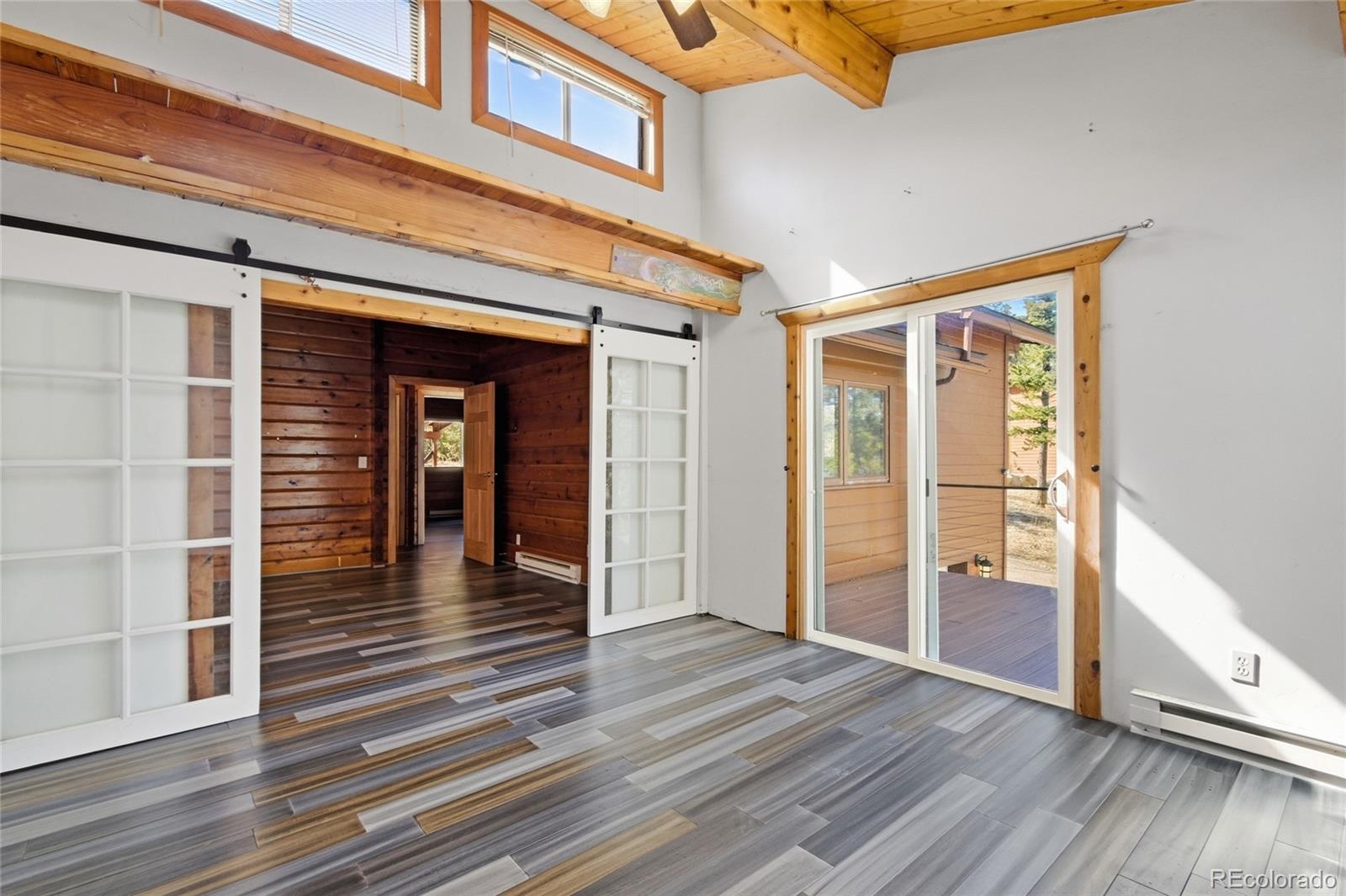 61 Ramona Road Golden, CO 80403 - Photo 28 of 49 an entryway of a house with wooden floor