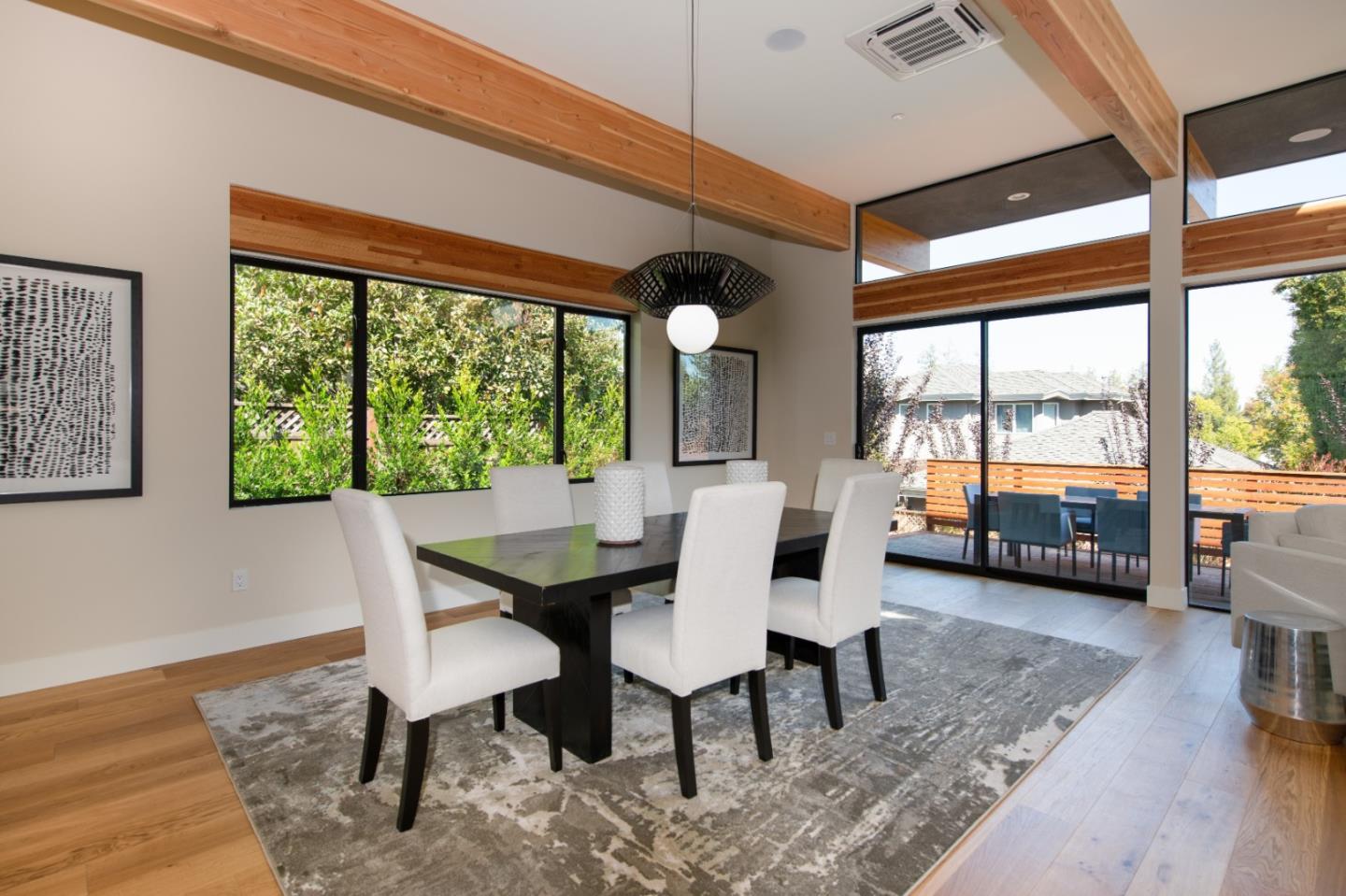 1617 Corte Via Los Altos, CA 94024 - Photo 9 of 27 a dining room with furniture a chandelier and wooden floor