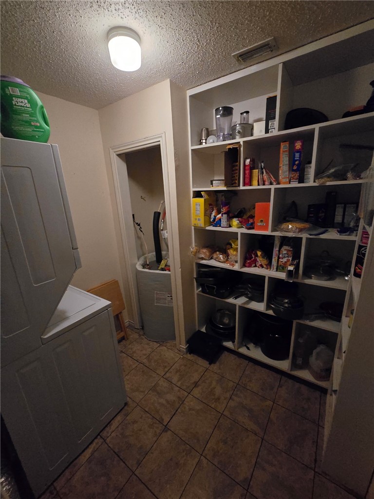24772 County Road 360 Mathis, TX 78368 - Photo 16 of 30 a view of walk in closet with empty racks