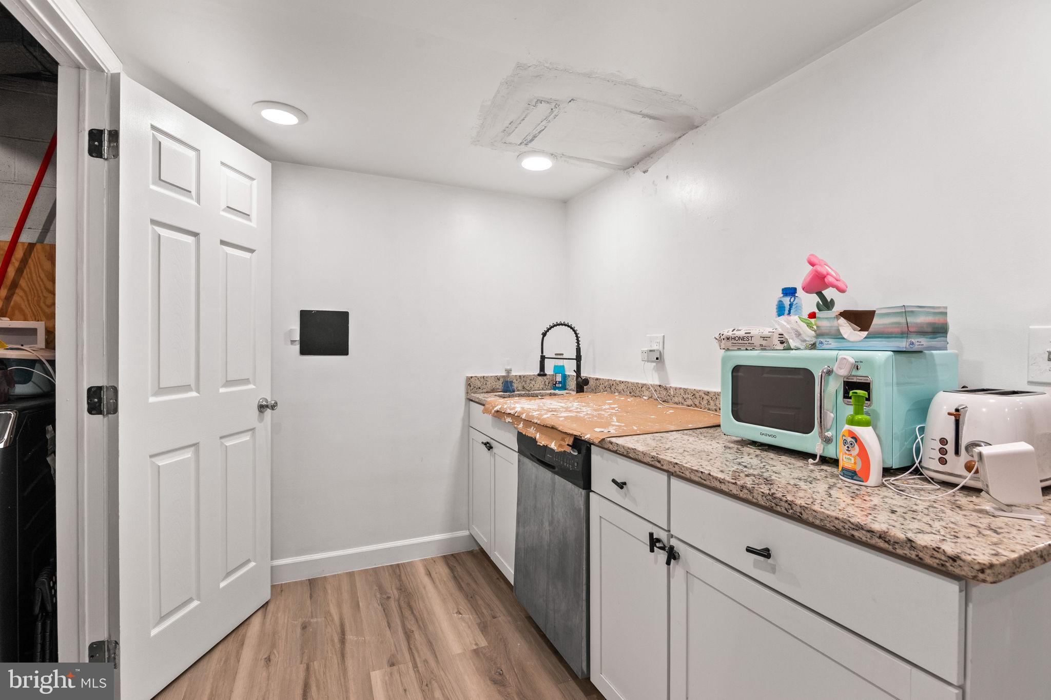 1007 Arcola Avenue Silver Spring, MD 20902 - Photo 27 of 33 Basement kitchenette for entertaining.
