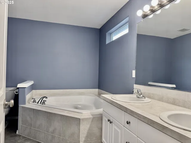 a view of a garage with racks on the wall