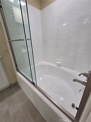 a bathroom with a bathtub
