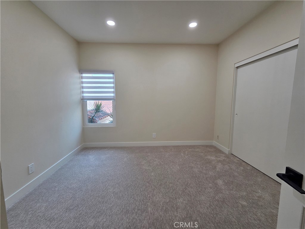 35 Ericson Aisle Irvine, CA 92620 - Photo 20 of 21 an empty room with windows