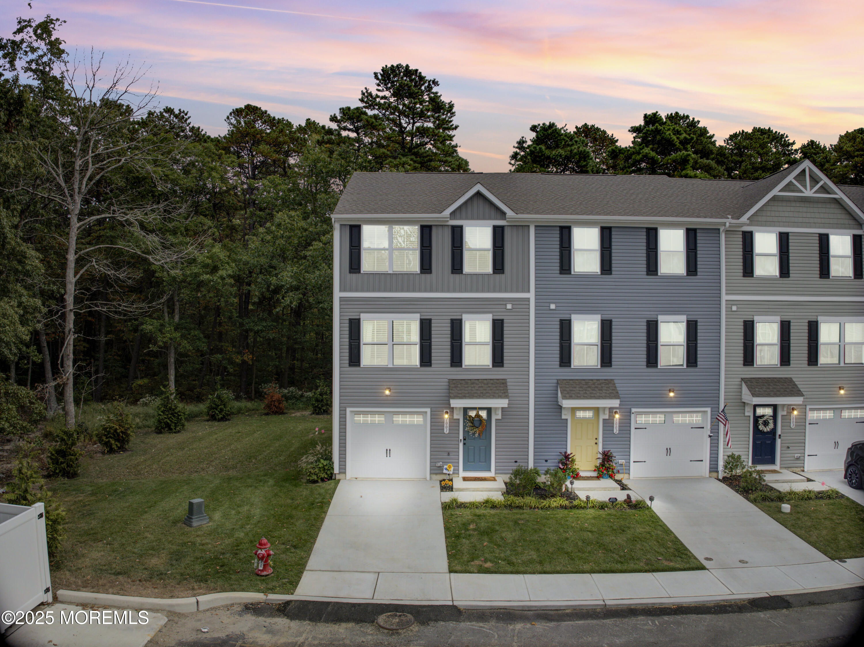 1001 Cypress Street Forked River, NJ 08731 - Photo 1 of 26 a front view of a house with garden