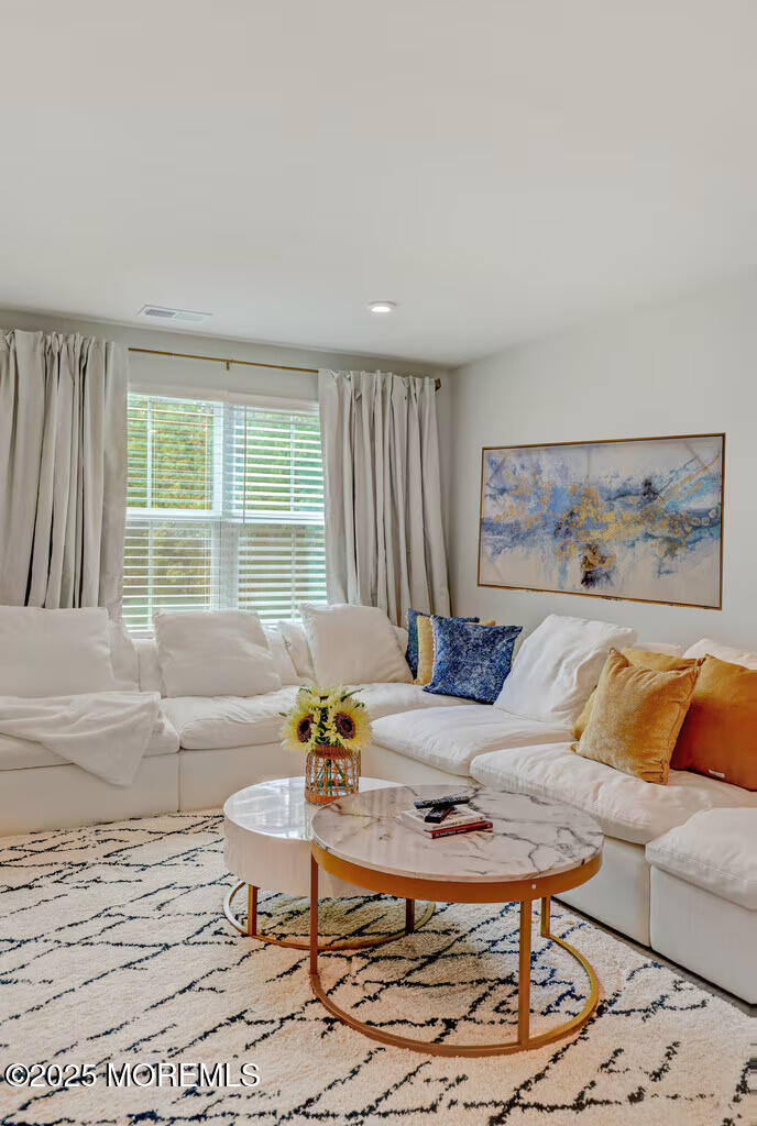 1001 Cypress Street Forked River, NJ 08731 - Photo 12 of 26 a living room with furniture and a large window