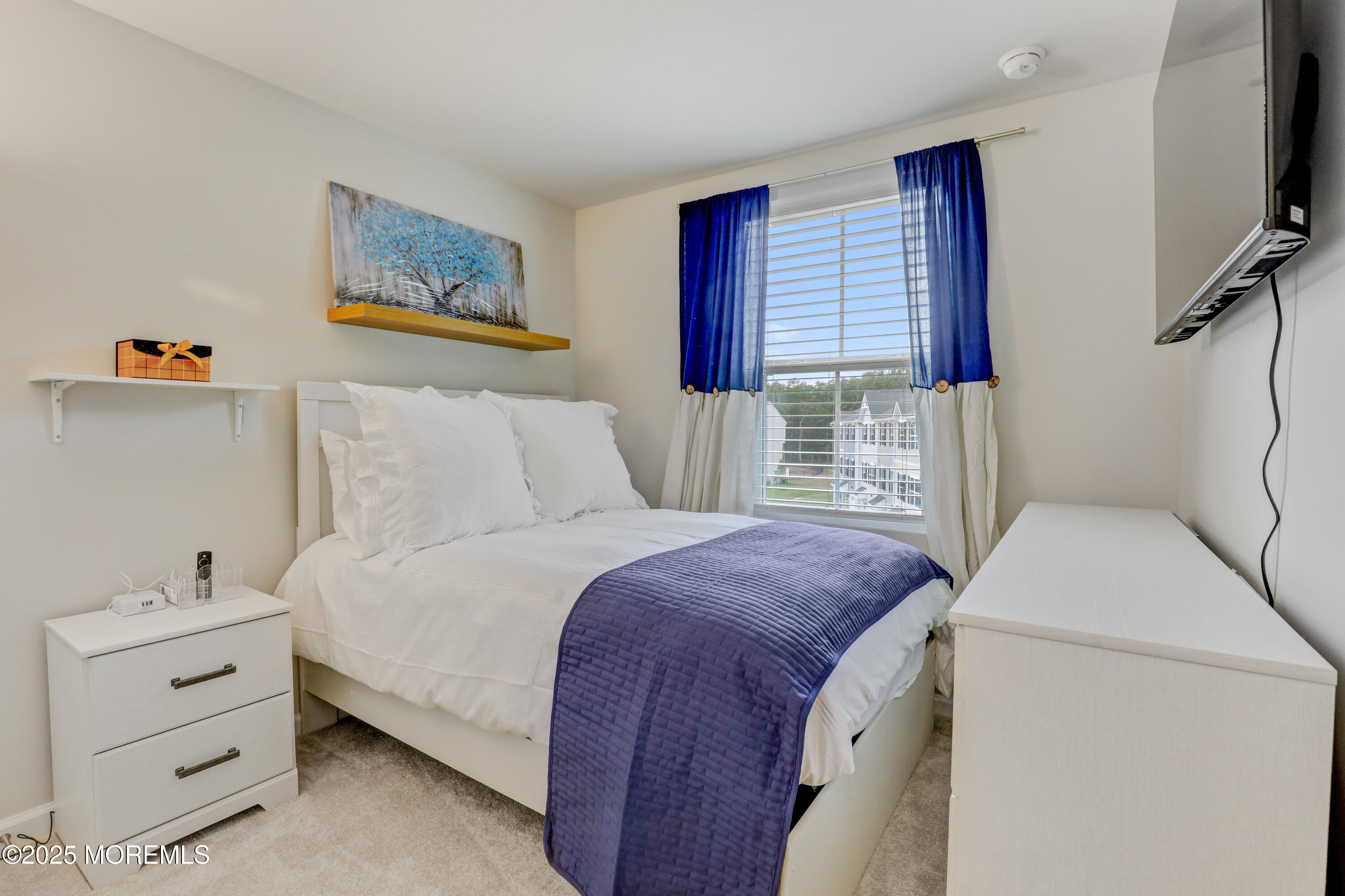 1001 Cypress Street Forked River, NJ 08731 - Photo 16 of 26 a bedroom with a bed and a window