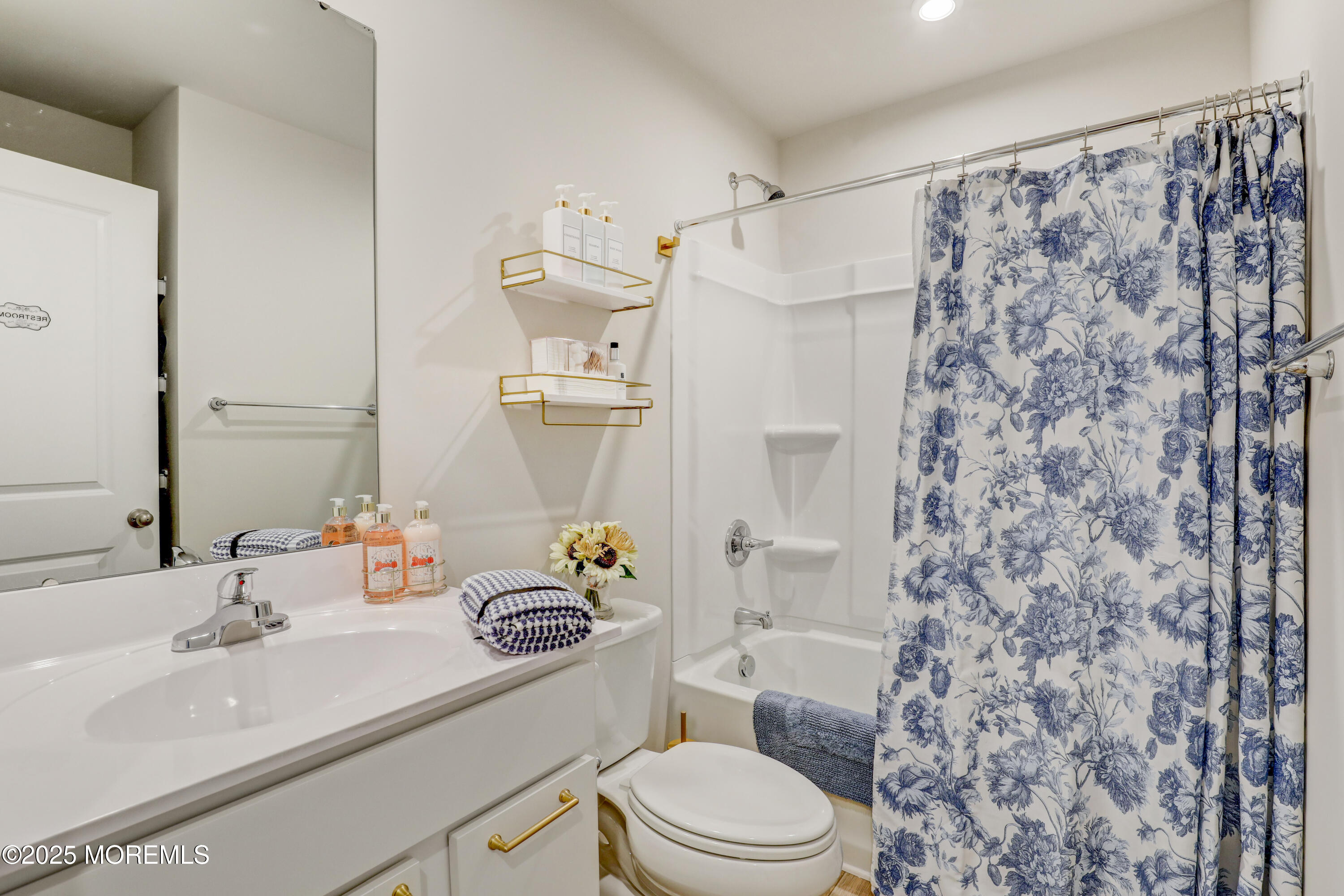 1001 Cypress Street Forked River, NJ 08731 - Photo 19 of 26 a bathroom with a sink toilet and shower