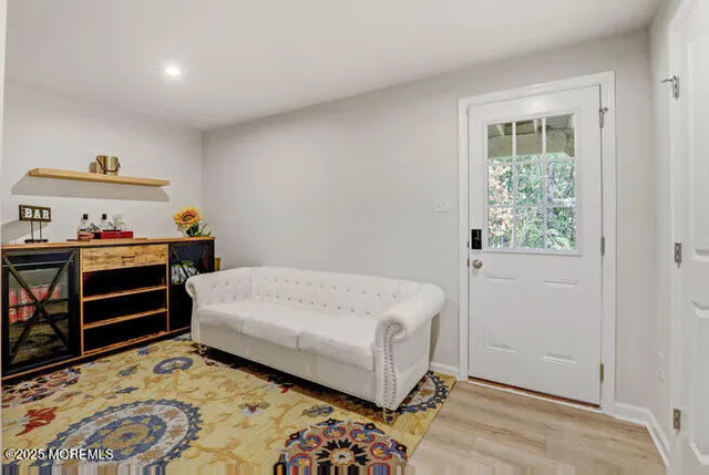 a view of storage and utility room with washer and dryer