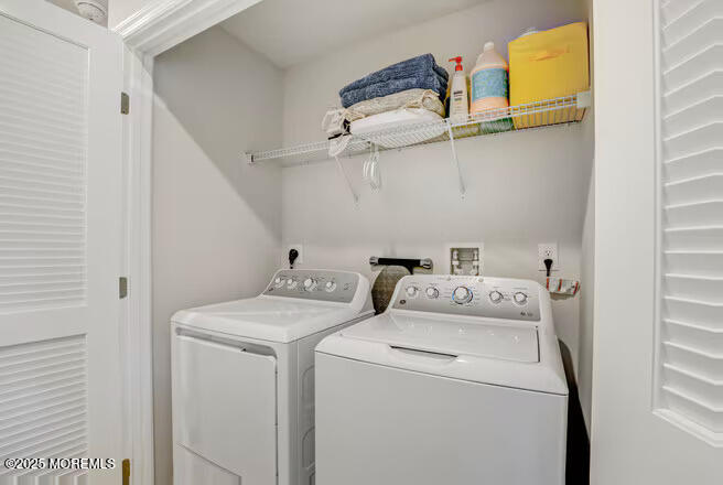 1001 Cypress Street Forked River, NJ 08731 - Photo 21 of 26 a view of storage and utility room with washer and dryer