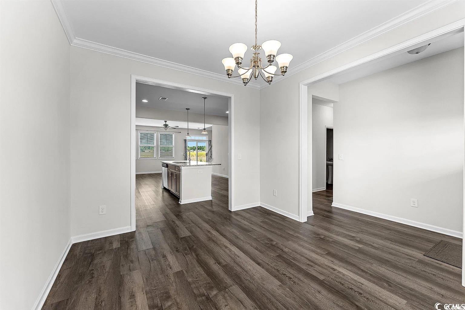 260 Red Maple Loop Longs, SC 29568 - Photo 25 of 34 Unfurnished dining area featuring dark hardwood /