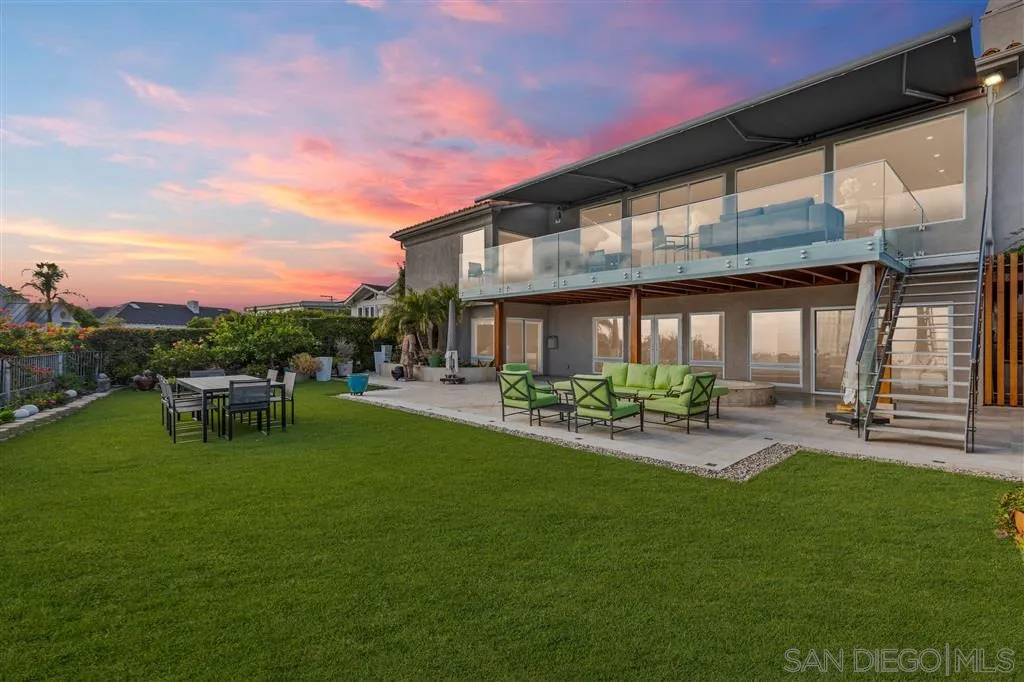 931 La Jolla Rancho Road La Jolla, CA 92037 - Photo 1 of 25 a view of a house with backyard porch and sitting area