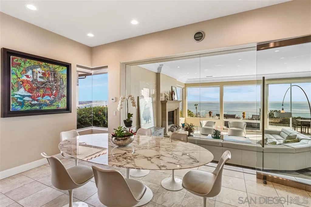 931 La Jolla Rancho Road La Jolla, CA 92037 - Photo 11 of 25 a living room with furniture and a large window
