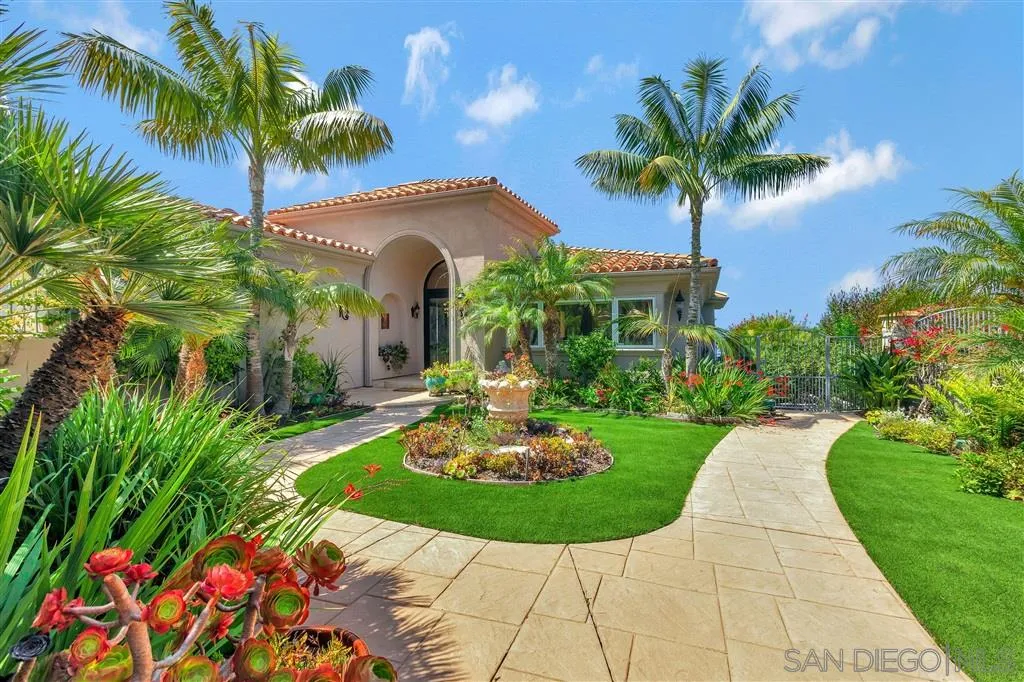 931 La Jolla Rancho Road La Jolla, CA 92037 - Photo 25 of 25 a front view of a house with garden