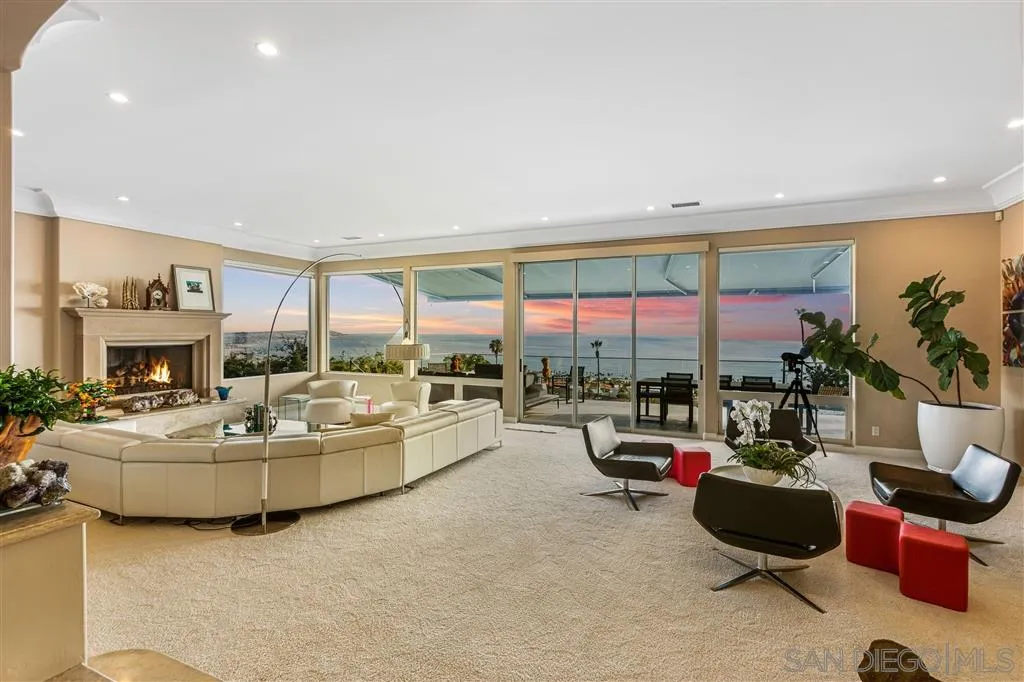 931 La Jolla Rancho Road La Jolla, CA 92037 - Photo 3 of 25 a living room with furniture and a large window