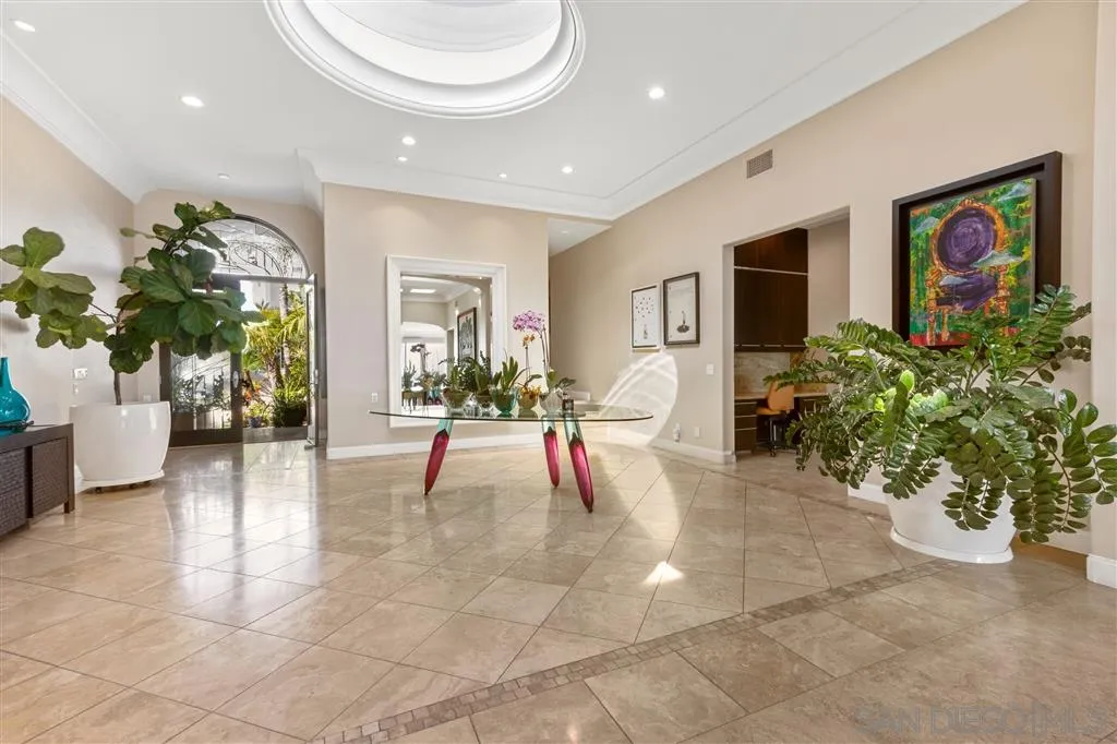 931 La Jolla Rancho Road La Jolla, CA 92037 - Photo 5 of 25 a view of a lobby with furniture and a potted plant